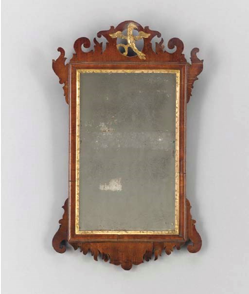 AN AMERICAN MAHOGANY AND PARCEL-GILT MIRROR,