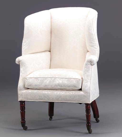 A REGENCY MAHOGANY WING ARMCHAIR,