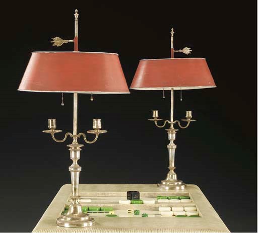 A PAIR OF LOUIS XVI STYLE SILVERED TWO-LIGHT CANDELABRA MOUNTED AS LAMPS,