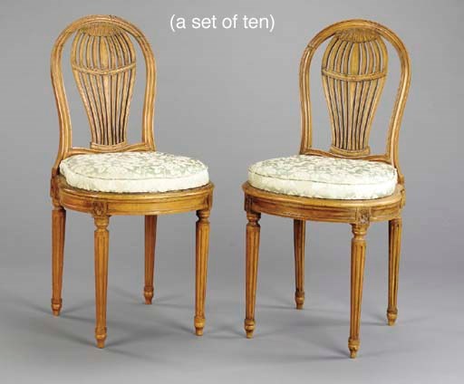 A SET OF TEN LOUIS XVI STYLE BEECHWOOD DINING CHAIRS,