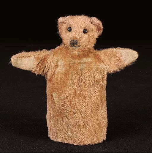 A British teddy bear glove puppet