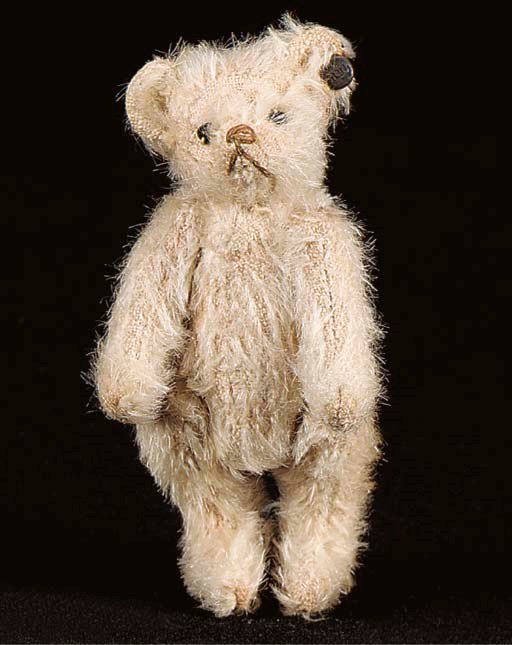 A Steiff miniature teddy bear