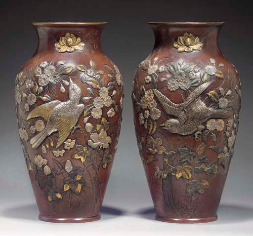 A pair of bronze baluster vases
19th century