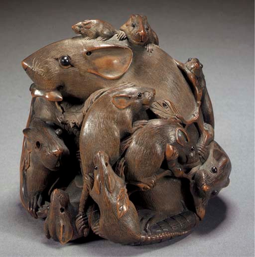 A boxwood okimono of a rat and its young
19th Century