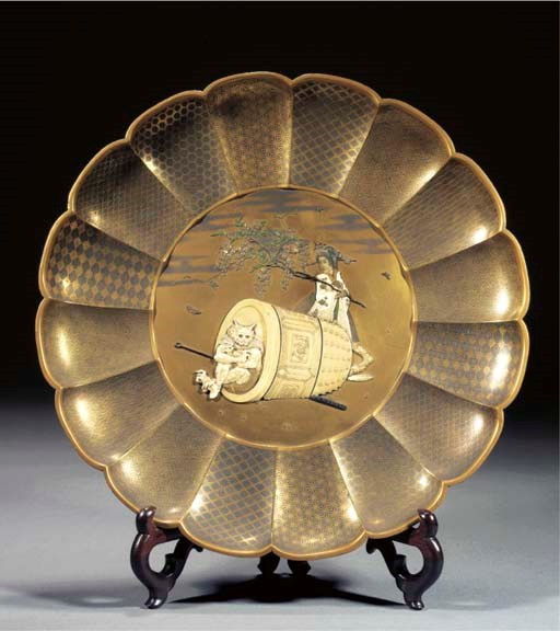 A gold lacquer and shibayama-style dish
Meiji period