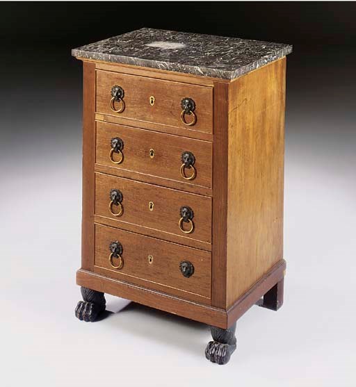 AN EMPIRE ORMOLU AND BRONZE-MOUNTED MAHOGANY COMMODE