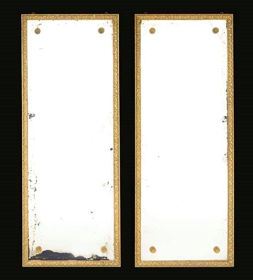 A PAIR OF RESTAURATION ORMOLU-MOUNTED GILTWOOD MIRRORS