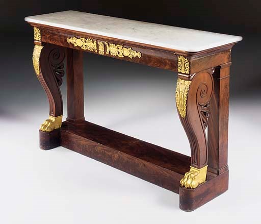 A RESTAURATION ORMOLU-MOUNTED MAHOGANY CONSOLE TABLE