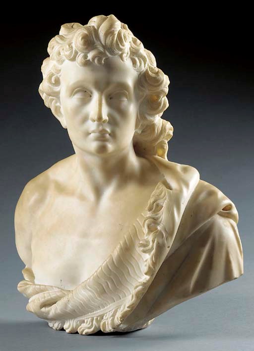 A CARVED MARBLE BUST OF A MAN