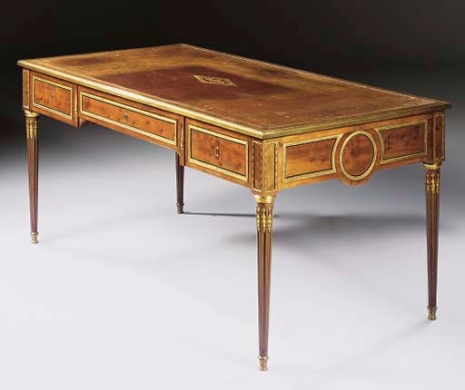 A LOUIS XVI ORMOLU-MOUNTED ACAJOU MOUCHETE (PLUM-PUDDING MAHOGANY) AND EBONY BUREAU PLAT