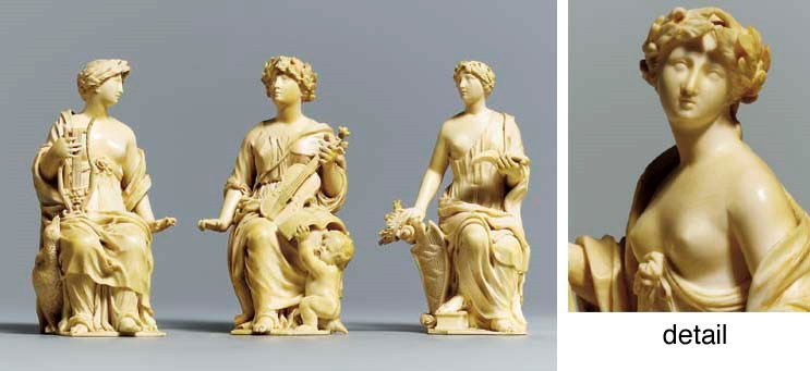 A GROUP OF THREE CARVED IVORY MUSES: ERATO, THALIA AND CLIO