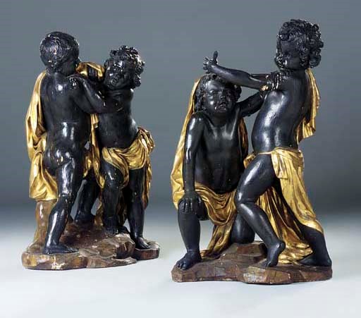 A PAIR OF PARCEL-GILT PAINTED CARVED WOOD VASE STANDS, EACH IN THE FORM OF TWO PUTTI