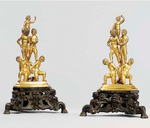 A PAIR OF PARCEL-GILT BRONZE GROUPS OF ACROBATS