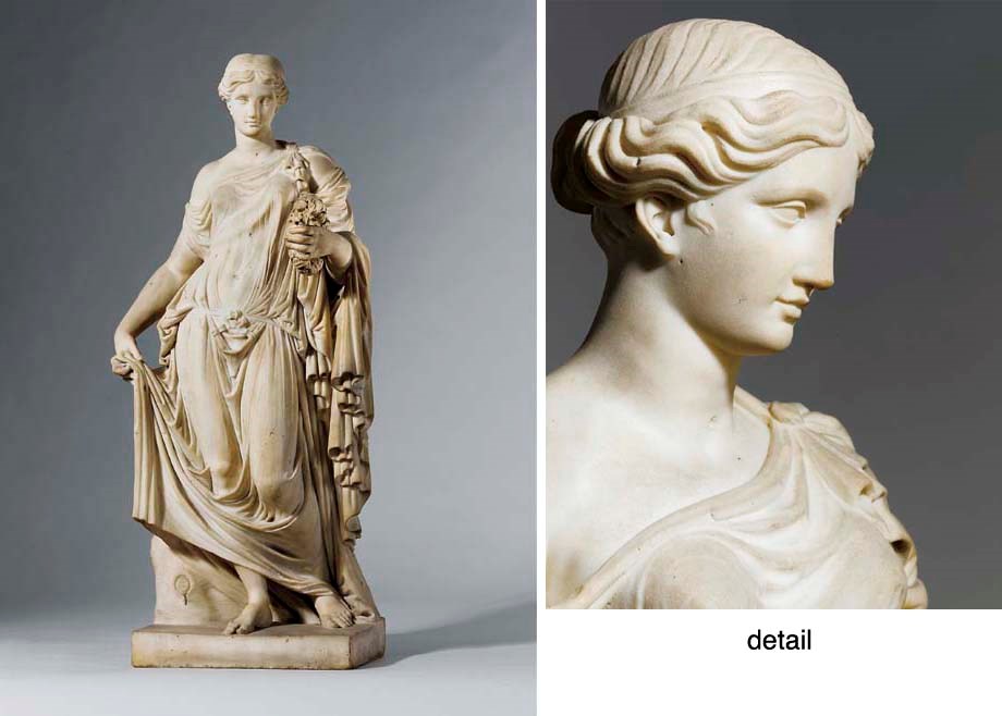 A CARVED MARBLE FIGURE OF THE FARNESE FLORA