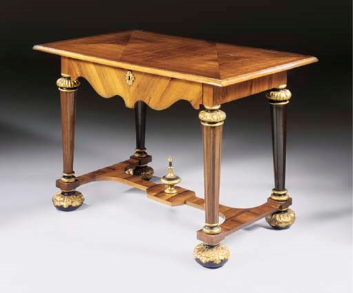 A GERMAN ROSEWOOD, EBONISED AND PARCEL-GILT SIDE TABLE