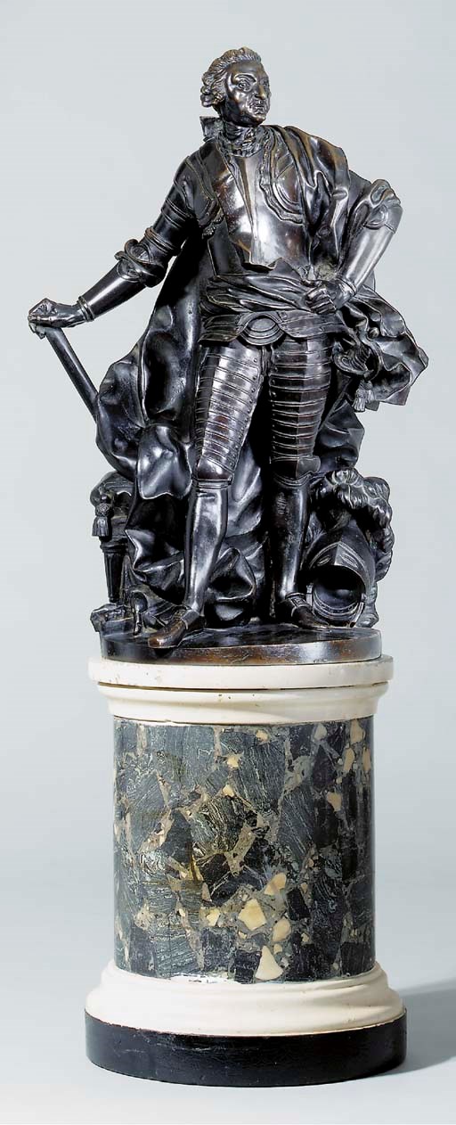 A BRONZE FIGURE OF A MAN IN ARMOUR, PROBABLY A MARÉCHAL DE FRANCE