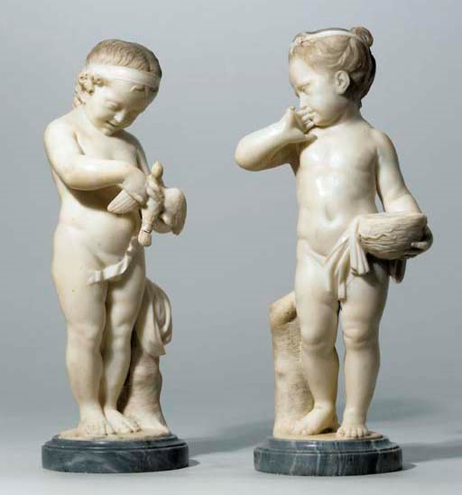 A PAIR OF MARBLE FIGURES OF A YOUNG BOY AND GIRL