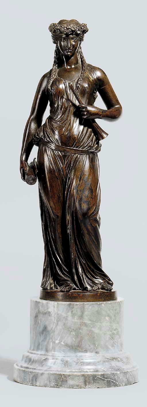 A BRONZE FIGURE OF THE MUSE CLIO