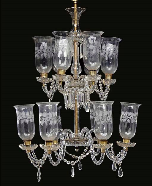 A glass twelve light chandelier