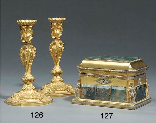 A pair of ormolu candlesticks