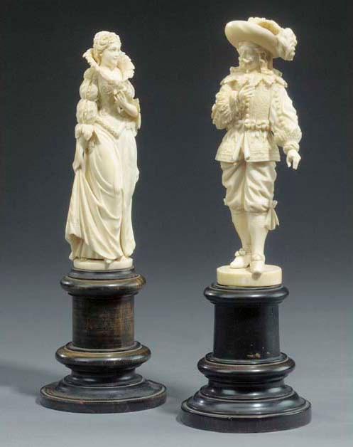 A matched pair of Dieppe carved ivory figures