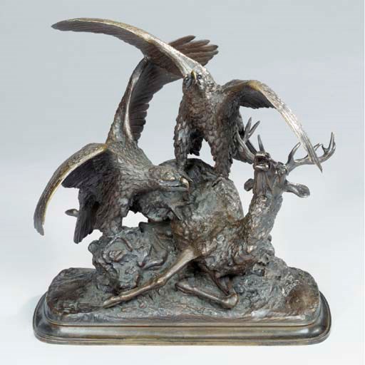 A French bronze group of a stag being attacked by eagles