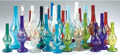 A collection of gilt heightened, opaque and tinted glass rose water sprinklers