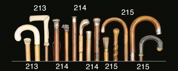 A group of five silver metal mounted malacca walking canes