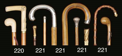 An ivory mounted malacca walking cane