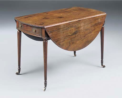 A REGENCY MAHOGANY OVAL PEMBROKE TABLE