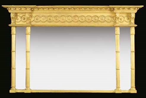 A REGENCY STYLE GILTWOOD AND GILT COMPOSITION OVERMANTEL MIRROR