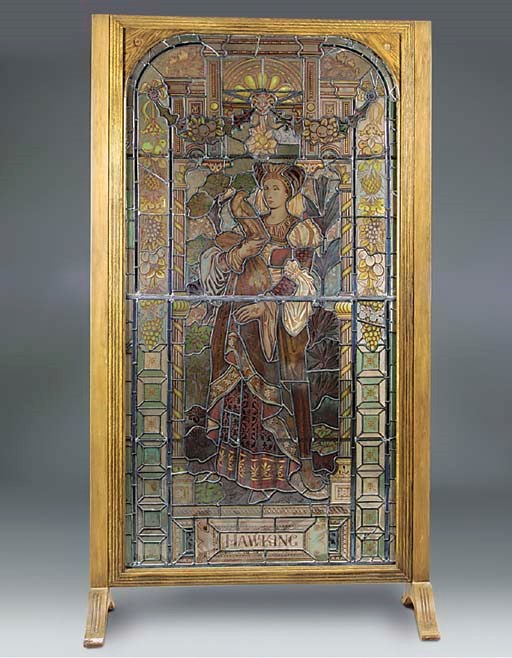A stained glass and oak framed panel