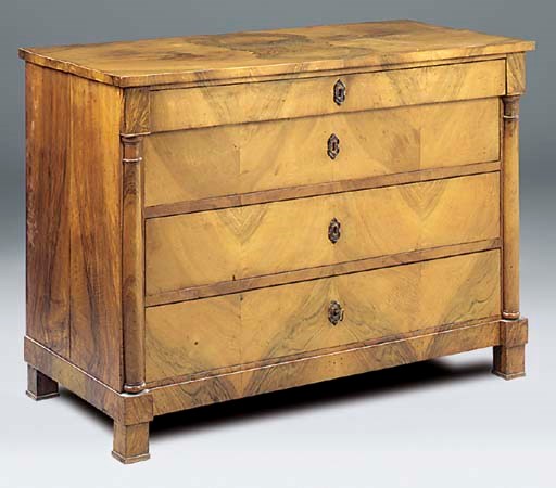 A French Empire walnut commode