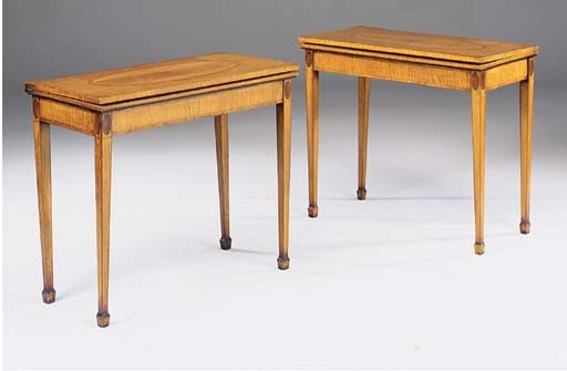 A pair of satinwood and rosewood crossbanded card tables