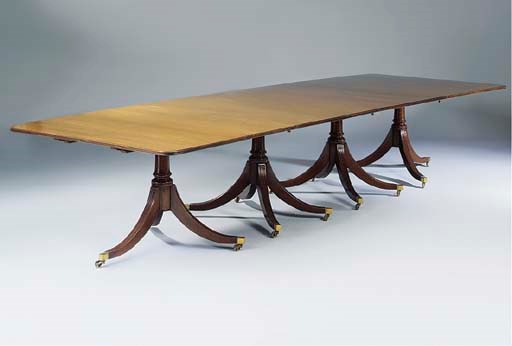 A mahogany four pedestal dining table