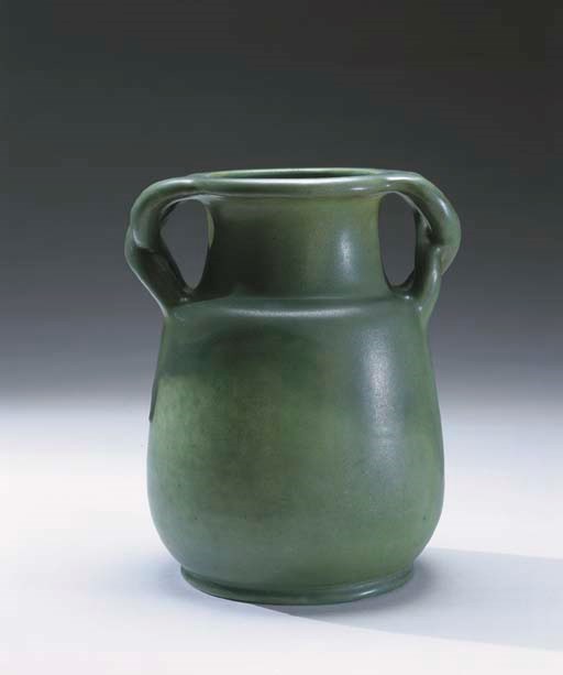 AN EARTHENWARE TWO-HANDLED VASE