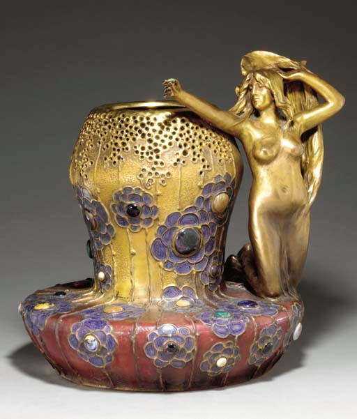 A LARGE DECORATED AND APPLIED EARTHENWARE VASE