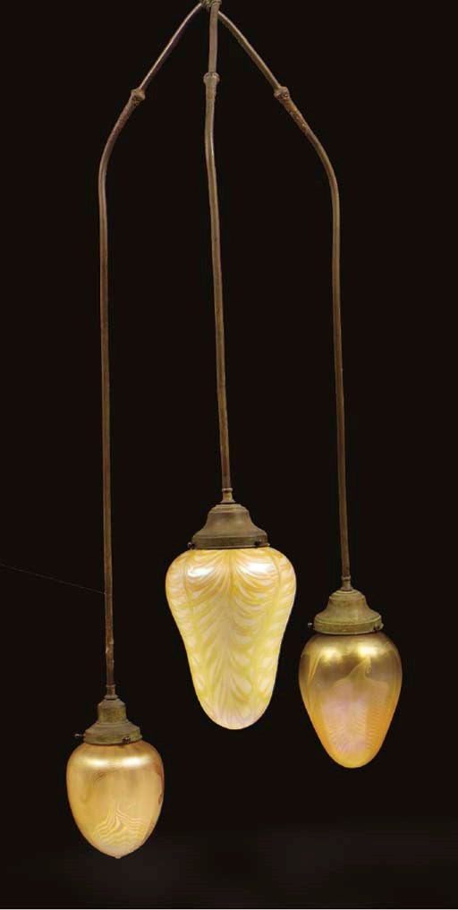 A FAVRILE GLASS, IRIDESCENT GLASS AND BRONZE THREE-LIGHT CHANDELIER