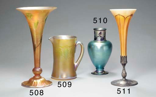 AN INTAGLIO-CARVED FAVRILE GLASS PITCHER