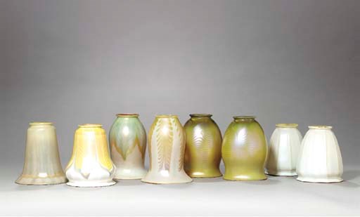 A GROUP OF EIGHT IRIDESCENT GLASS SHADES