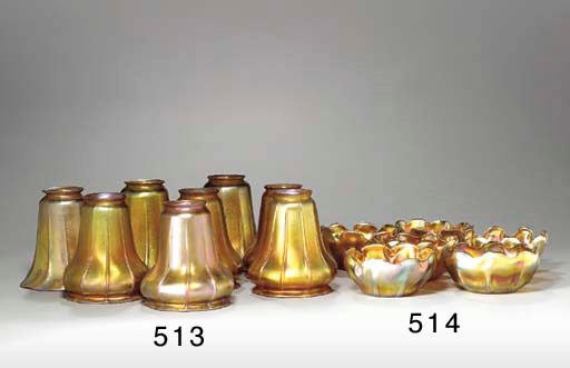 A GROUP OF EIGHT IRIDESCENT GLASS SHADES