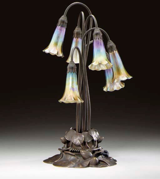 A SIX-LIGHT 'LILY' FAVRILE GLASS AND BRONZE TABLE LAMP