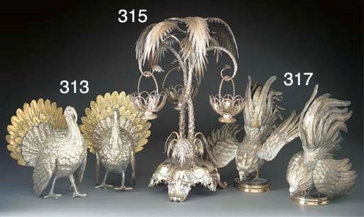 A Pair of Silver-Plated Fighting Cock Ornaments