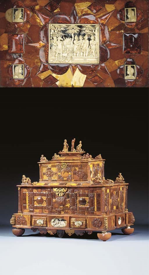 A CARVED AMBER AND IVORY TABLE CASKET