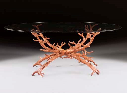A FRENCH RED-PAINTED CAST-IRON AND GLASS LOW OCCASIONAL TABLE
