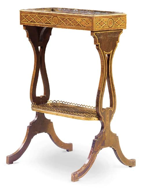 A LOUIS XVI ORMOLU-MOUNTED SYCAMORE AND DOT-TRELLIS PARQUETRY TRICOTEUSE