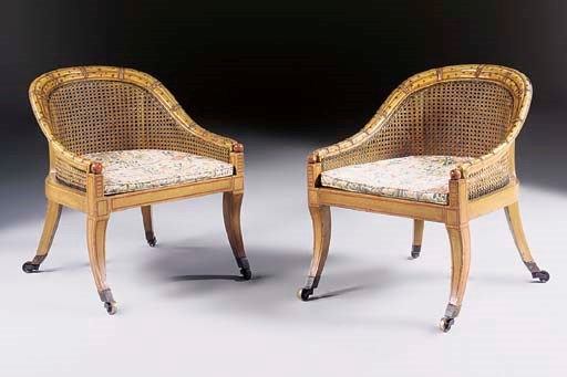 A PAIR OF REGENCY POLYCHROME-DECORATED SIMULATED BAMBOO TUB BERGERES