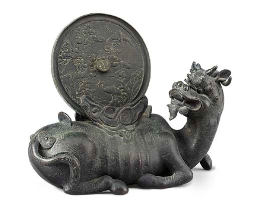 A Chinese bronze mirror stand