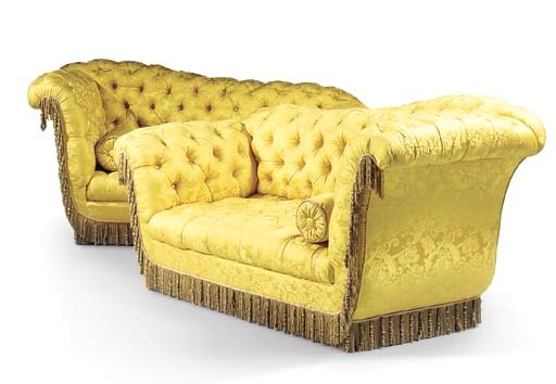 A PAIR OF FRENCH UPHOLSTERED SOFAS