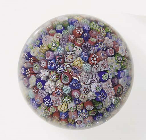 A Baccarat signed and dated close millefiori weight